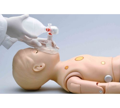 A learner places a bag valve mask over the mouth and nose of the Pediatric HAL one-year-old patient simulator